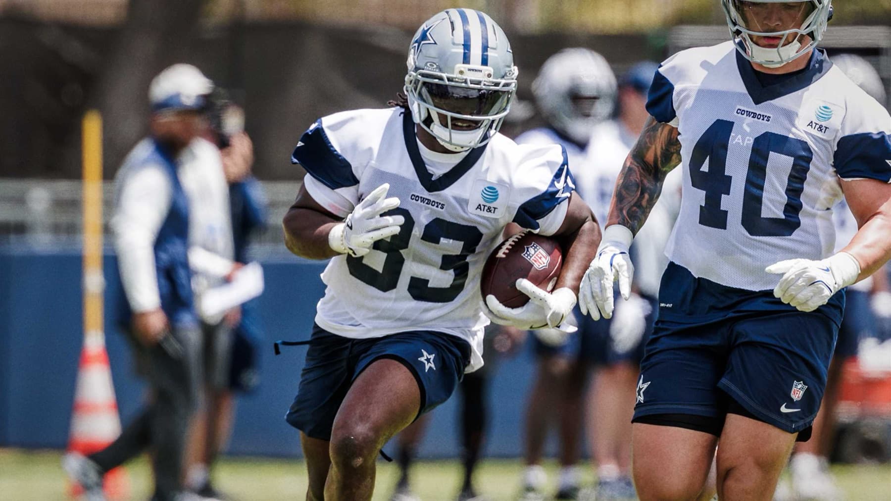 Javonte Williams carrying the ball at Dallas Cowboys training camp in 2026