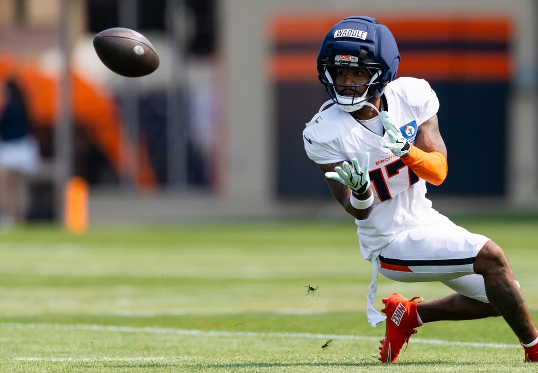 Jaylen Waddle catching a pass at Denver Broncos training camp in 2026