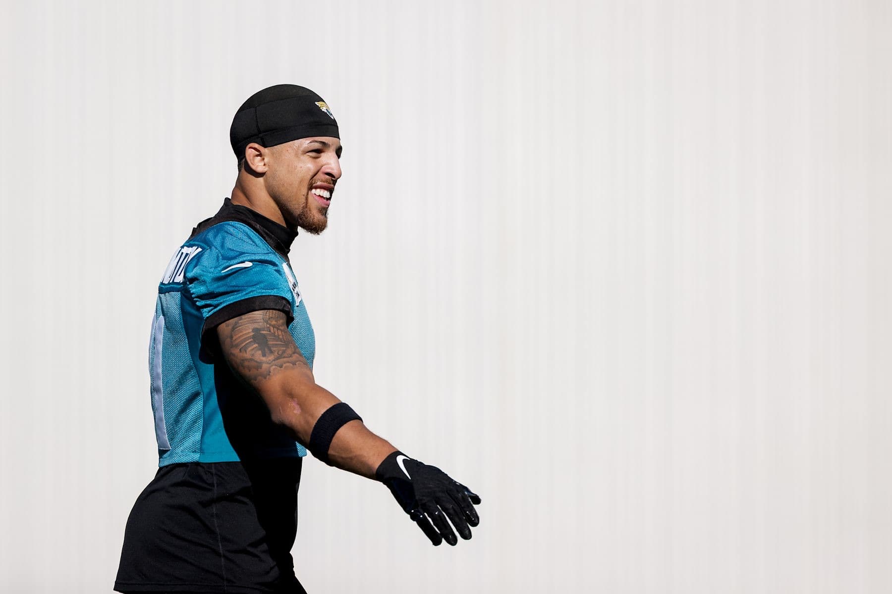 Parker Washington smiling at Jacksonville Jaguars practice