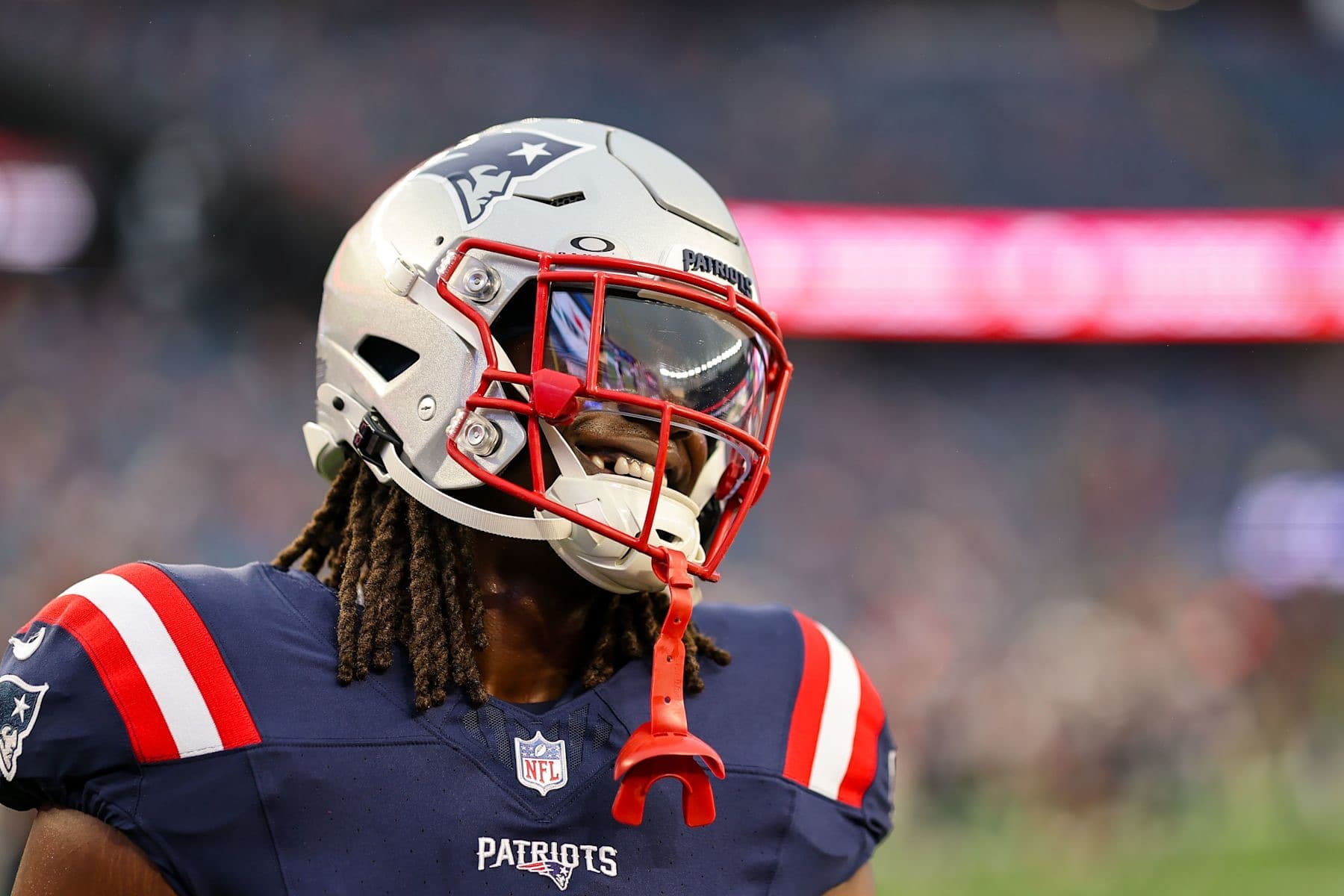 Rhamondre Stevenson smiling during New England Patriots warm-ups